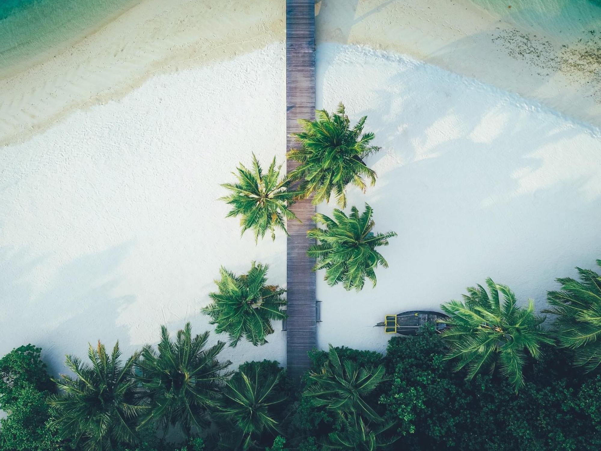 Coco Bodu Hithi - 50 Percent Off Shared Roundtrip Speedboat For Stays From 1 May To September 2025 Esterno foto Aerial view of the beach